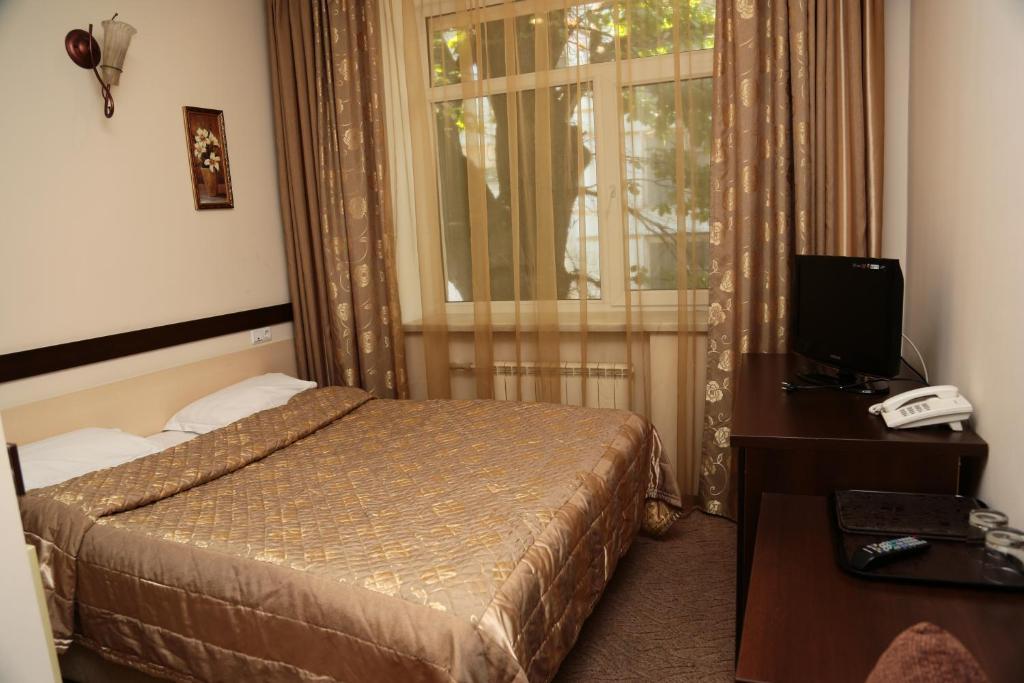 Salem On Tulebaeva Street Hotel Алмати Номер фото